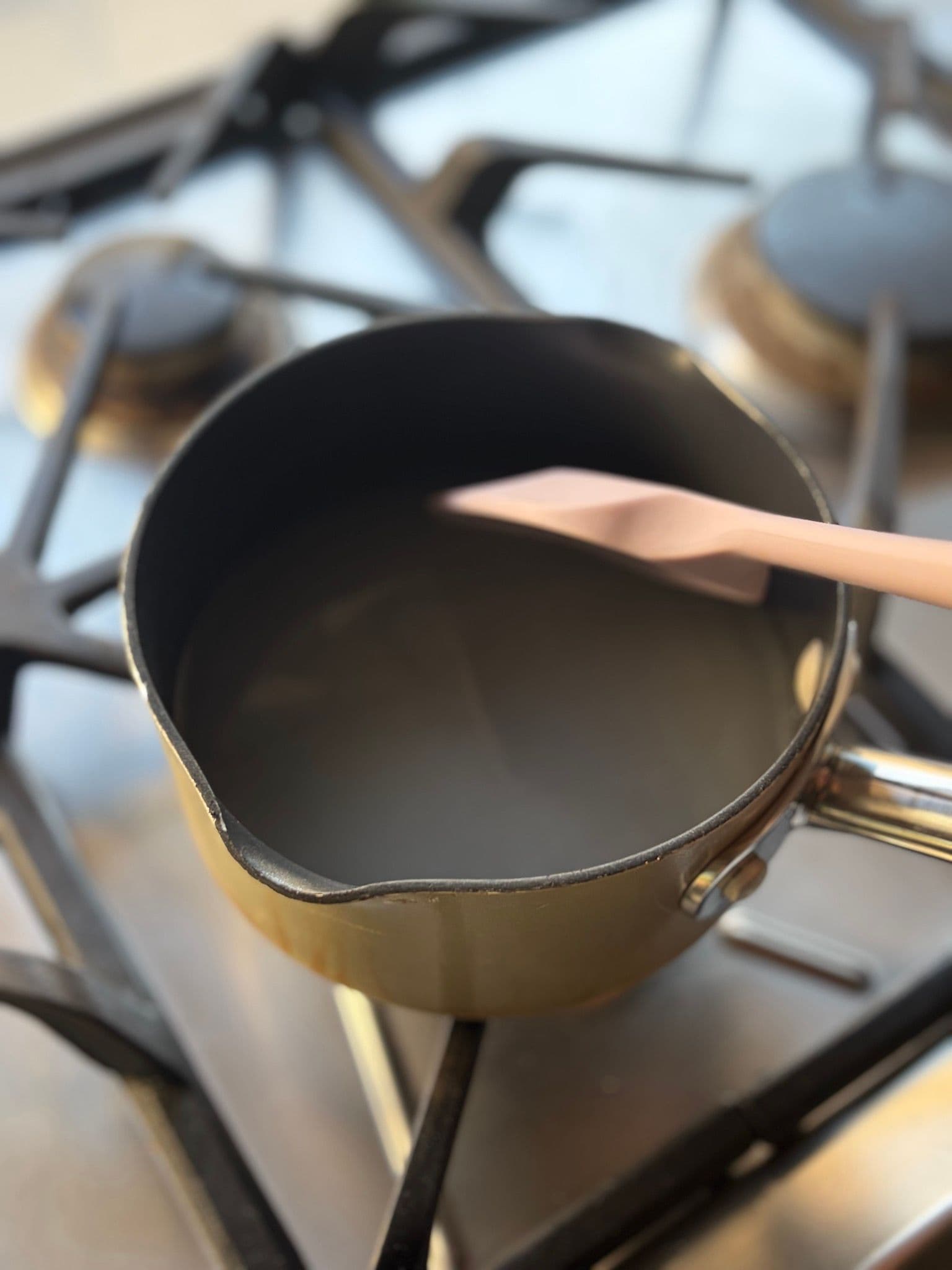 Sugar and water in the pan before boiling