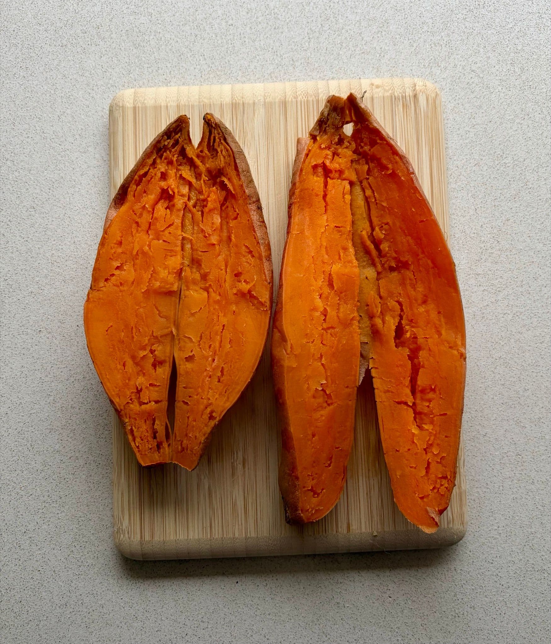 Sweet potato cut in half after microwaving
