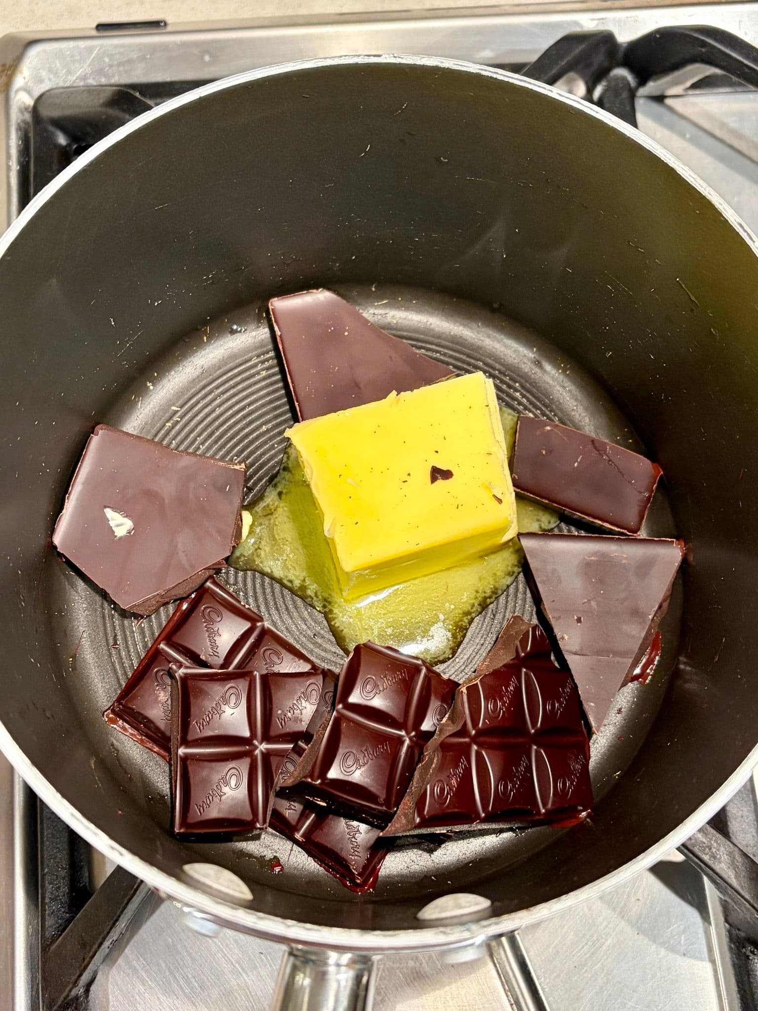 Chocolate and butter in the pan before melting