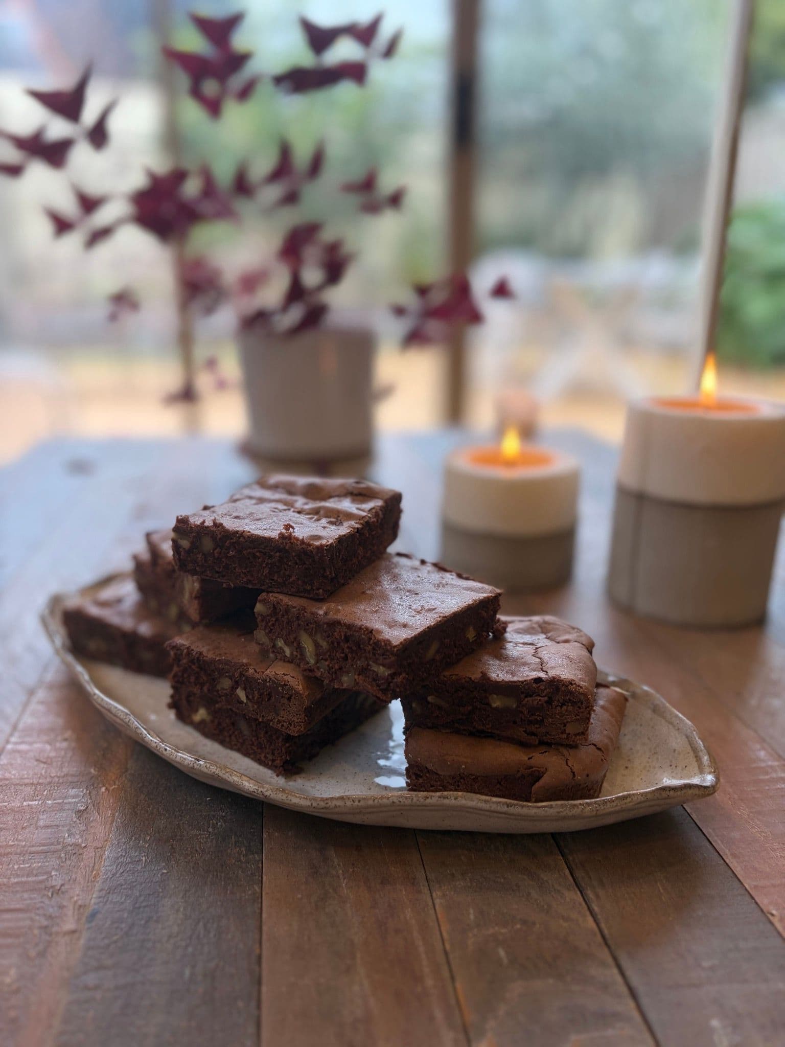 Brownies cut into squares on baking paper