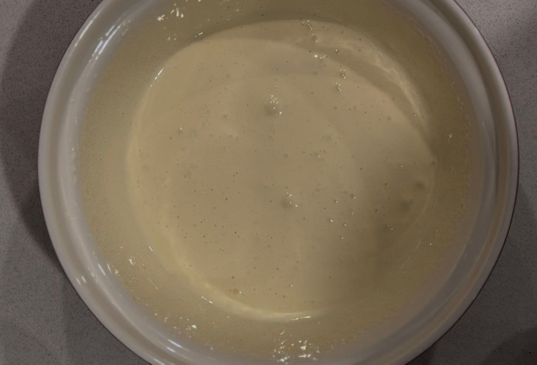 The eggs and sugar whipped pale and thick