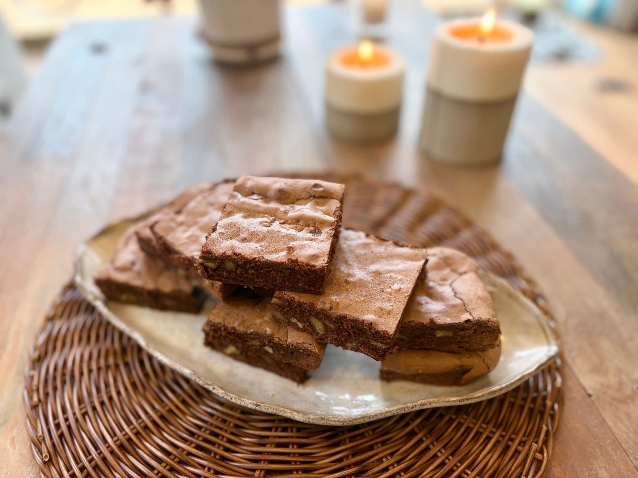 Brownies with a shiny crackled top, cut into squares