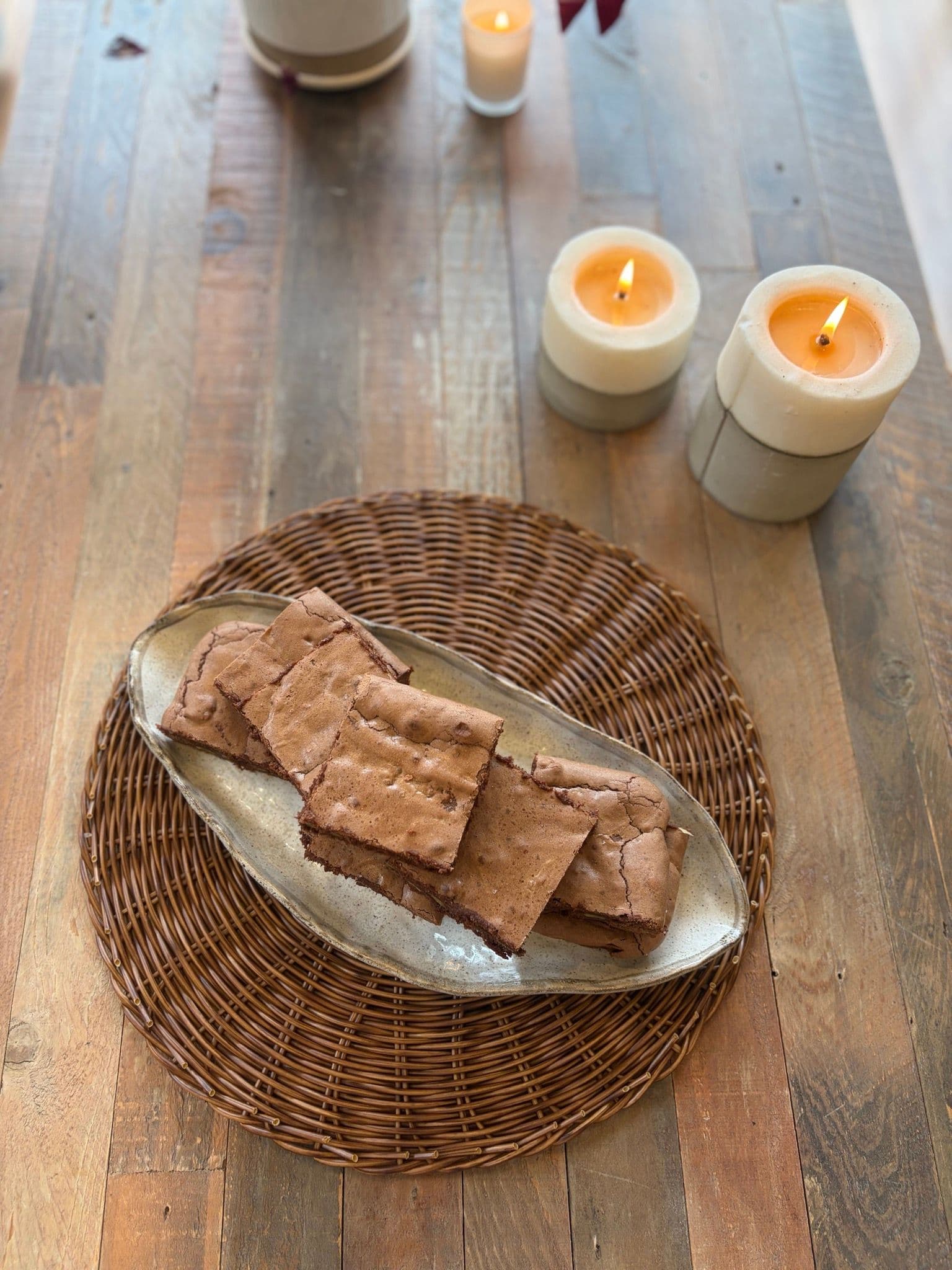 A stack of brownies showing the fudgy centre
