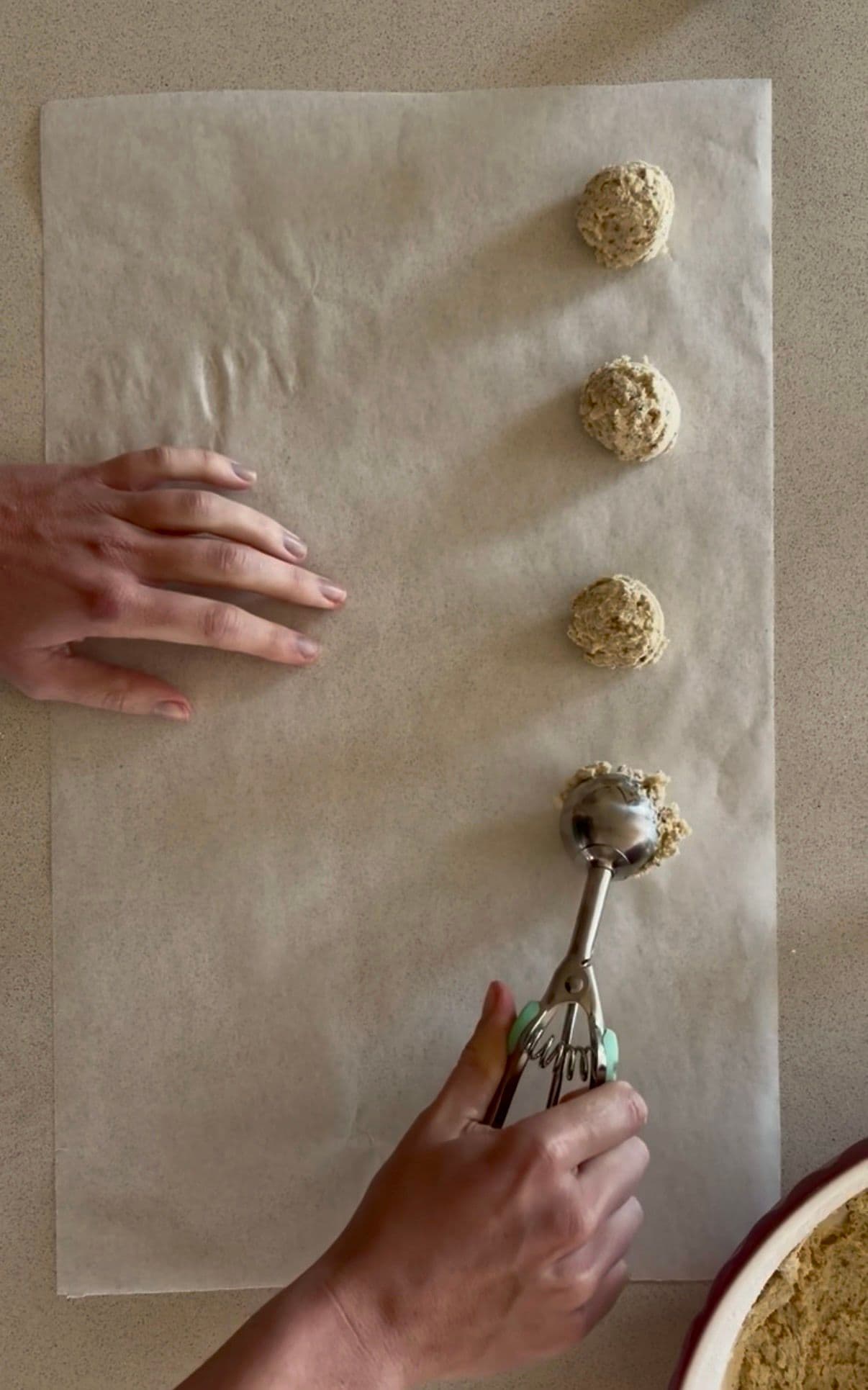 Scooping dough onto tray