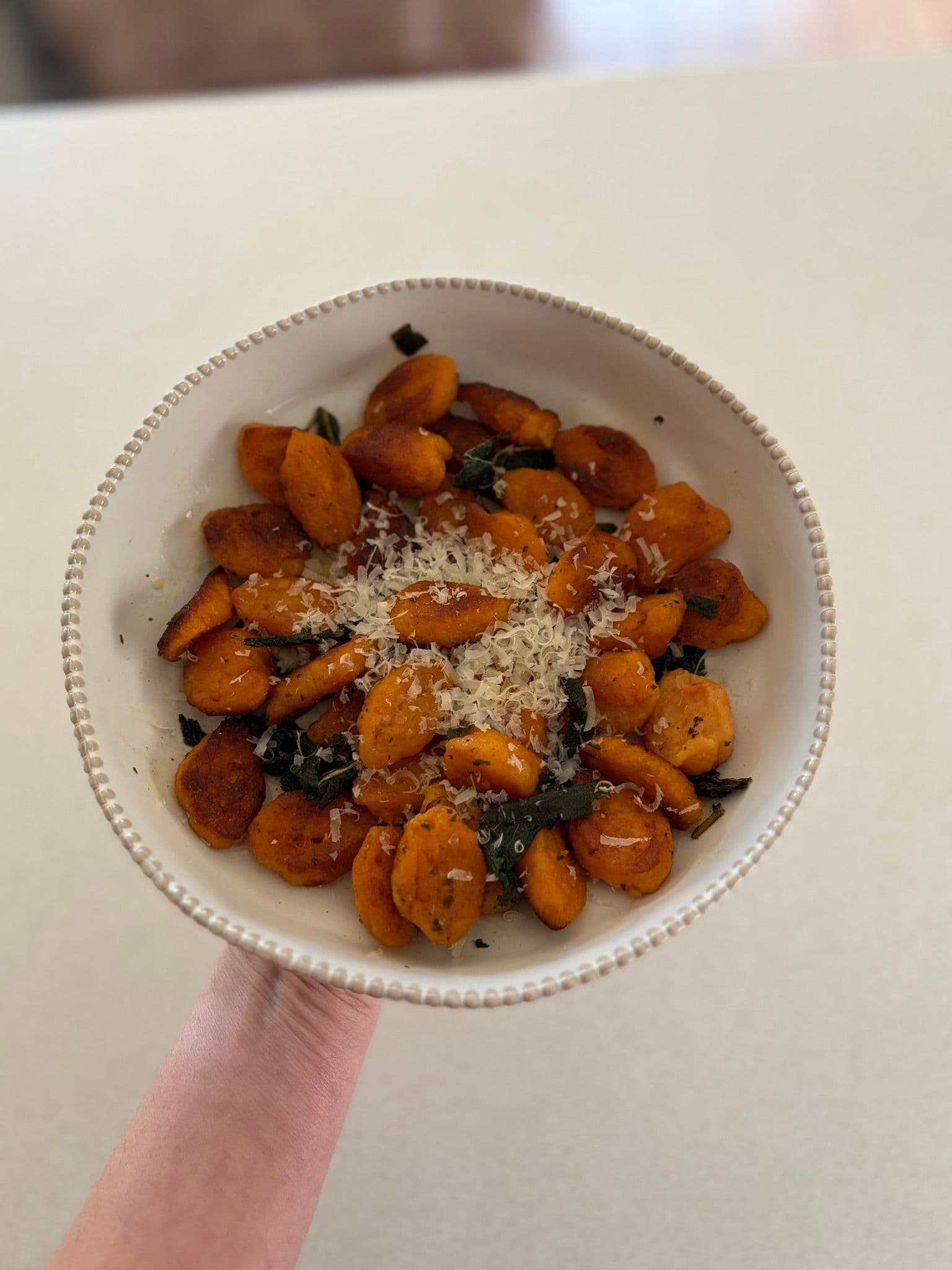 Gnocchi served with grated parmesan