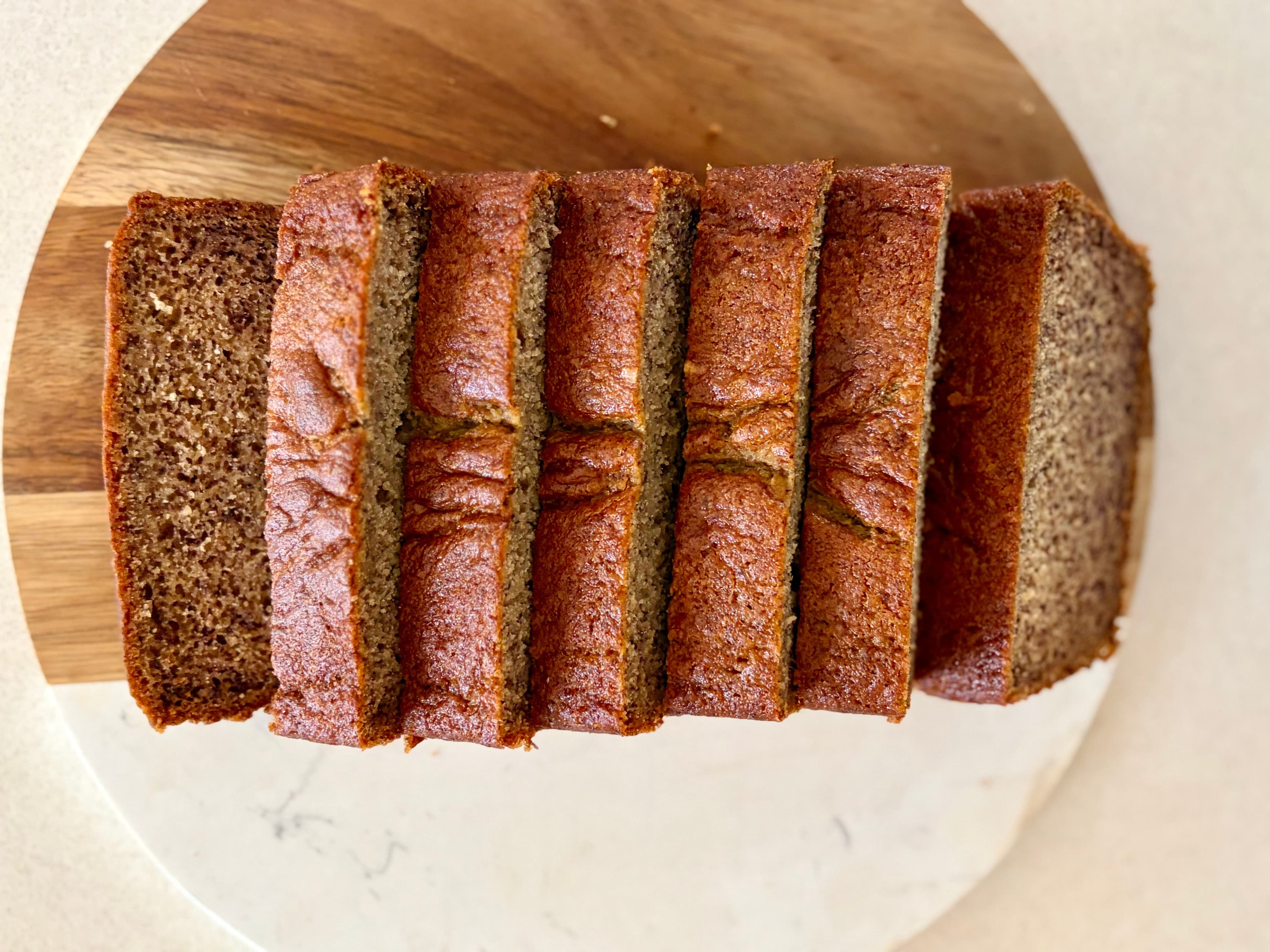 Sliced banana bread on a wire rack