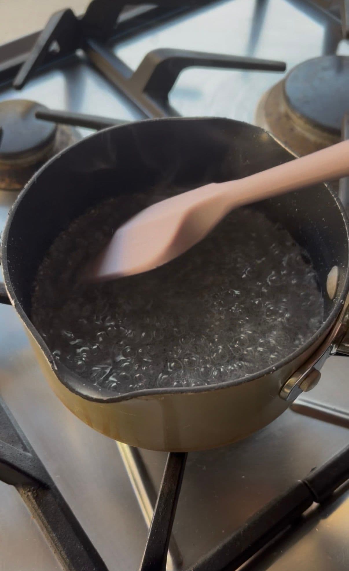 The sugar syrup at a full boil