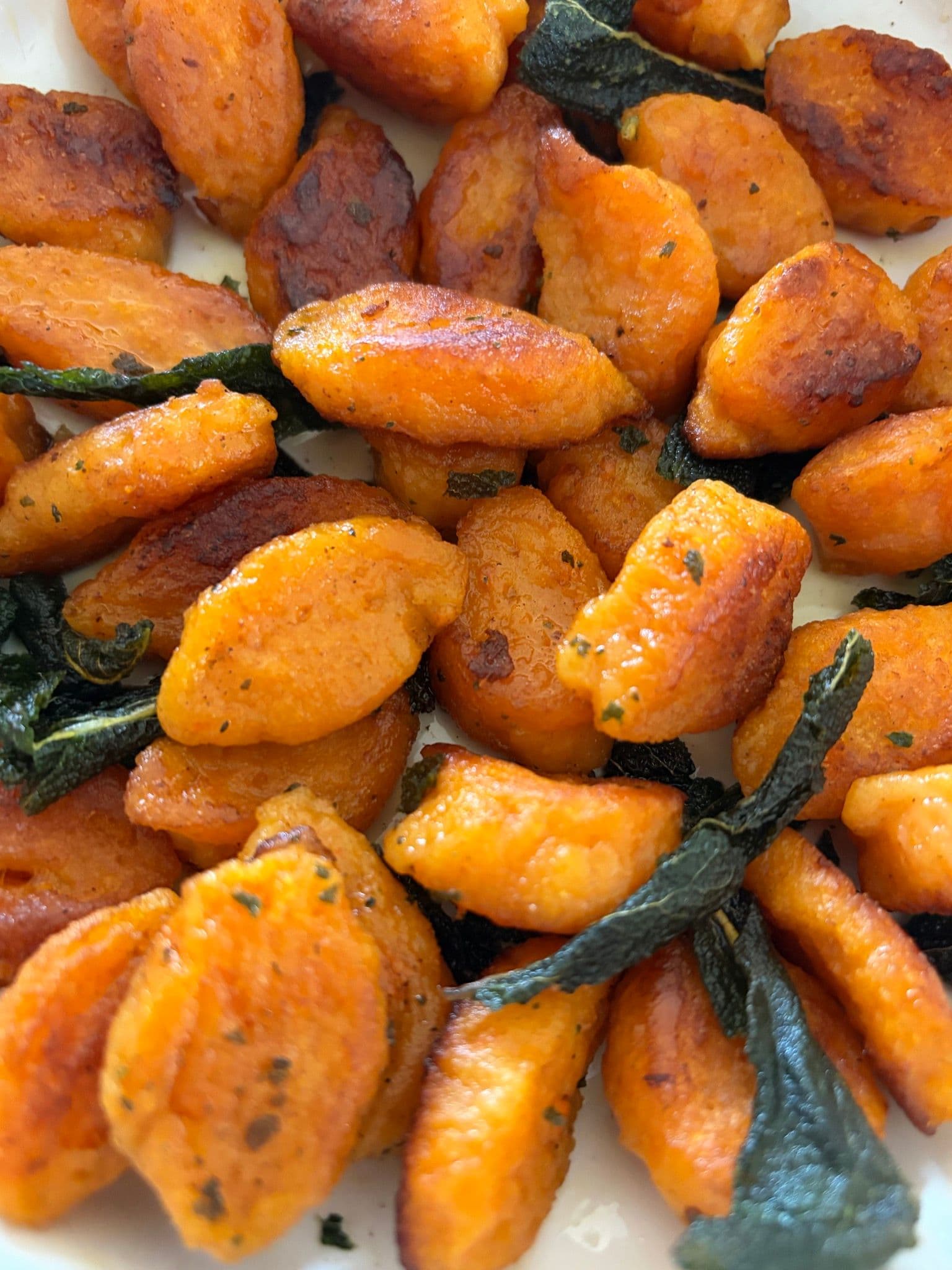 Close up of gnocchi in sage brown butter
