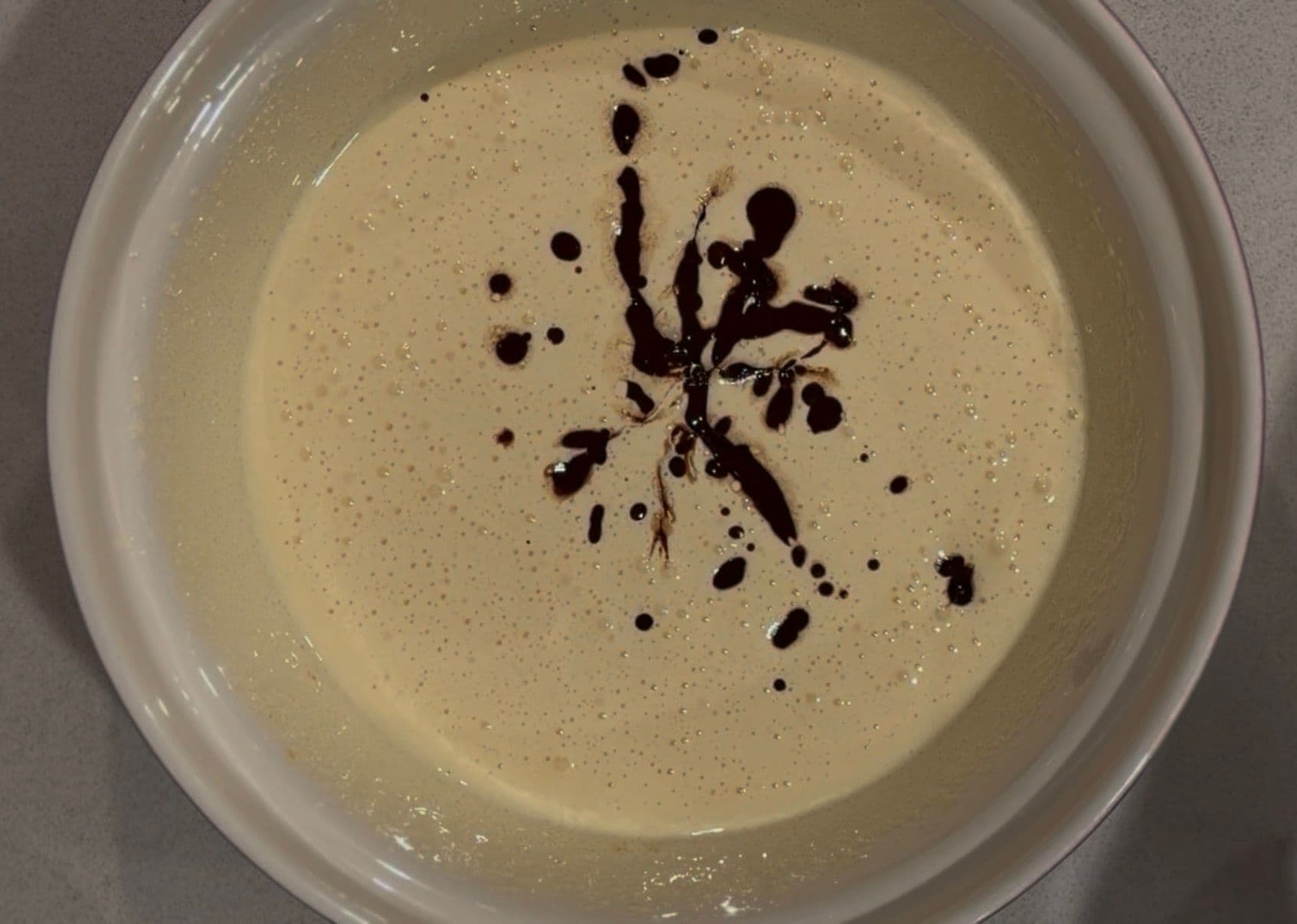 The melted chocolate going into the whipped eggs
