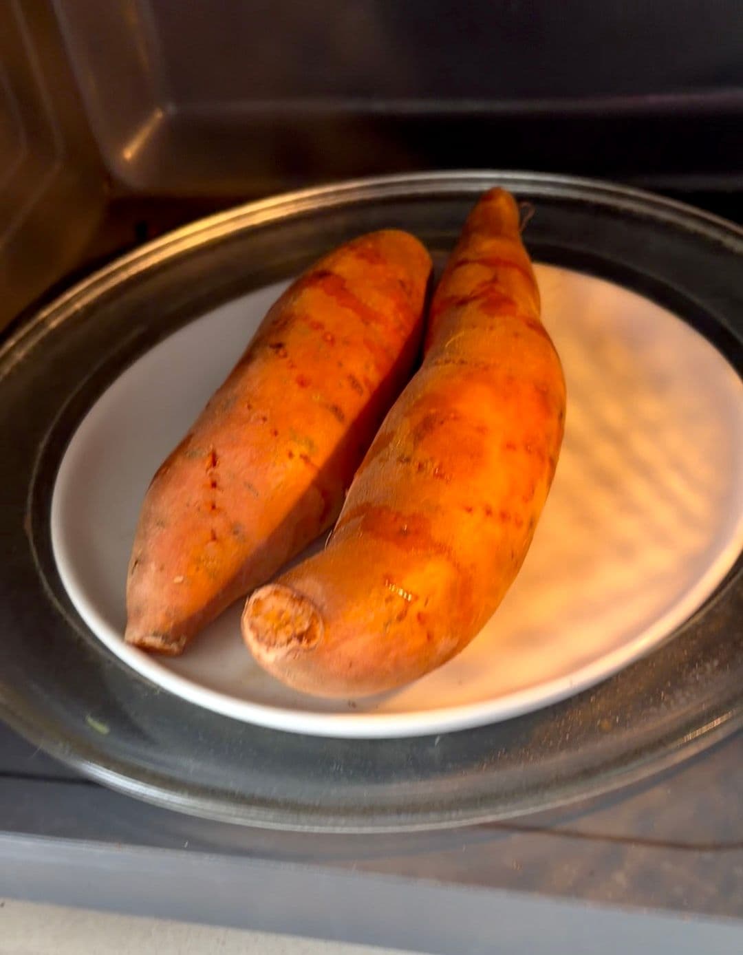 Sweet potato cooking in the microwave